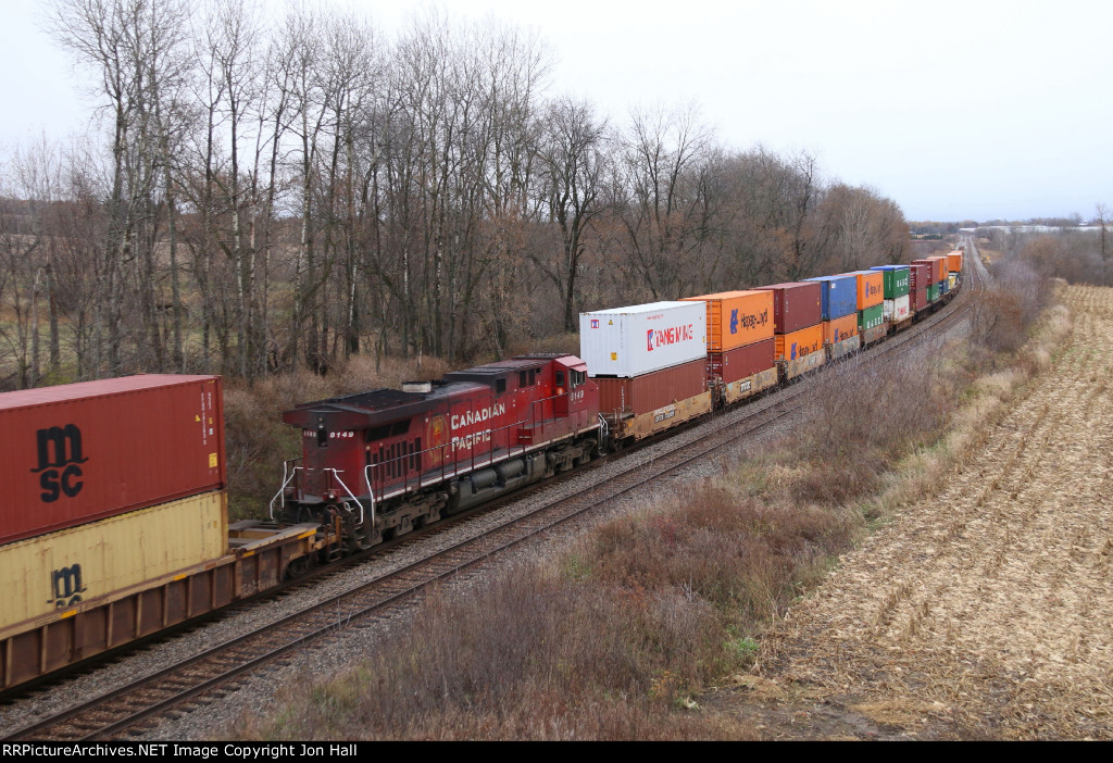 CP 8149 comes along as the mid train DPU on 199